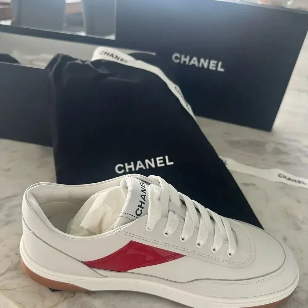 Chanel Woman’s White Sneakers with red and grey CC logo